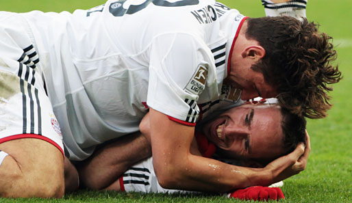 Franck Ribery und Mario Gomez wollen auch in der Zukunft für Bayern München Fußball spielen