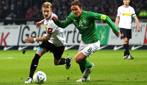 Clemens Fritz (r.) bleibt Werder Bremen noch mindestens zwei weitere Jahre erhalten
