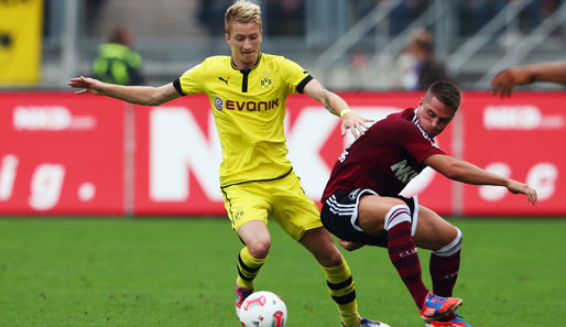 Marco Reus (l.) traf sofort im ersten Bundesligaspiel nach seiner Rückkehr zum BVB