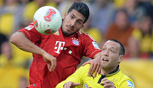 Emre Can (l.) im Kampf um den Ball mit Dortmunds Julian Schieber
