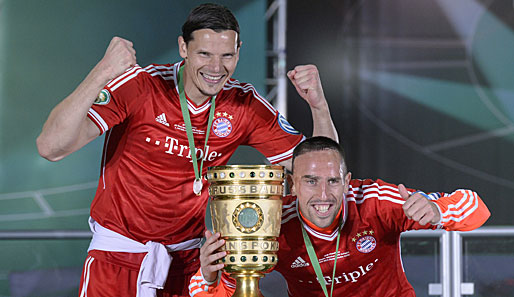 Daniel van Buyten (l.) und Frank Ribery haben ihre Verträge bei den Bayern verlängert