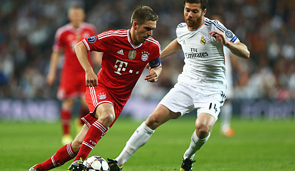 Künftig gemeinsam am Ball: Xabi Alonso (r.) wechselt von Real Madrid zu Philipp Lahms Bayern