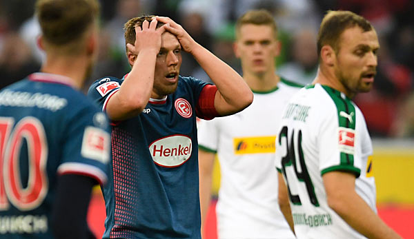 Düsseldorfer Fassungslosigkeit: Rouwen Hennings reagiert auf die Elfmeter-Entscheidung nach der Pause gegen den Aufsteiger bei einem vermeintlichen Handspiel von Kaan Ayhan.