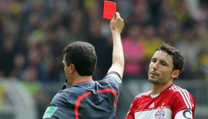 Mark van Bommel (FC Bayern München) am 24.2.2008 in Minute 90 gegen den Hamburger SV. Vergehen bei der zweiten Gelben Karte: unflätige Sprache.