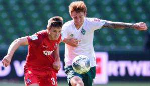 Kölns Noah Kattenbach im Duell mit Werder-Stürmer Josh Sargent.