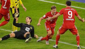 Joshua Kimmich (M.) jubelt nach seinem Siegtreffer im Supercup gegen Borussia Dortmund.