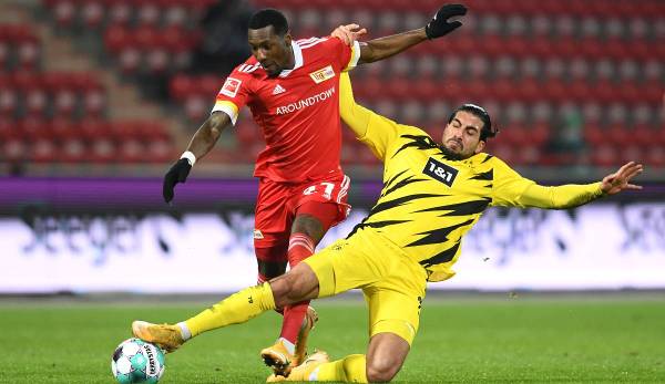 Borussia Dortmund (r.: Emre Can) steht gegen Union Berlin unter Druck.