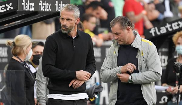 Michael Zorc (r.) hat sich zur Trainerdebatte über BVB-Coach Marco Rose (l.) geäußert.