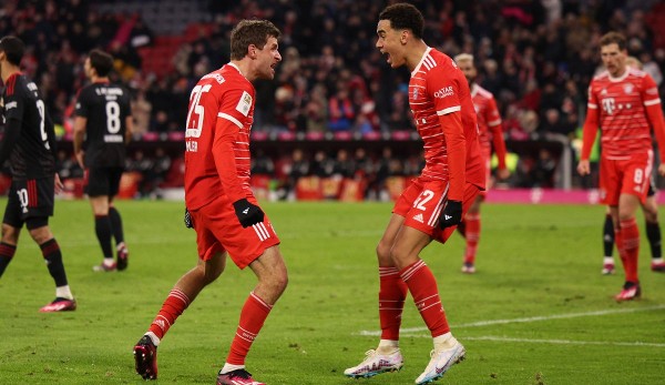 Thomas Müller (left) and Jamal Musiala celebrate a Bayern goal.