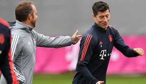 Verstehen sich offenbar blendend: Bayerns Interimstrainer Hansi Flick und Robert Lewandowski.
