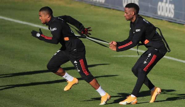 Not off to a good start: Douglas Costa and Bouna Sarr during training.