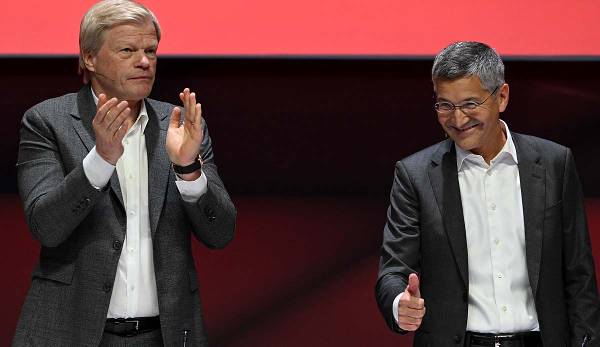 Oliver Kahn (left) and Herbert Hainer at FC Bayern's annual general meeting in Munich on Saturday.