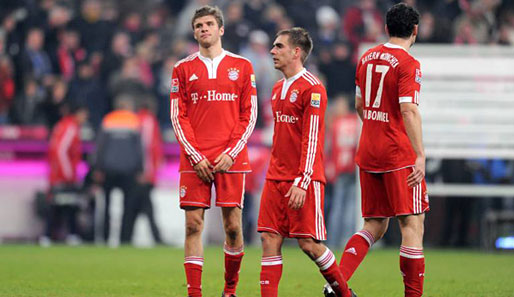 Enttäuschte Bayern: Thomas Müller, Philipp Lahm und Mark van Bommel (von links)