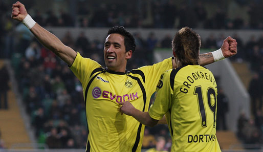 Lucas Barrios (l.) erzielte in den letzten zwölf Pflichtspielen elf Tore für den BVB
