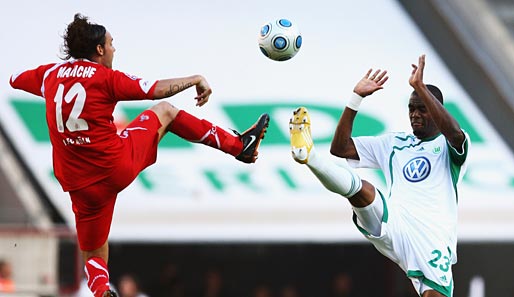 Köln - Wolfsburg 1:3: Hoch das Bein! Maniche und Grafite im Kampf um den Ball
