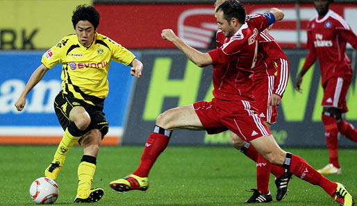 Shinji Kagawa (l.) erzielte gegen den HSV sein sechstes Saisontor für Borussia Dortmund