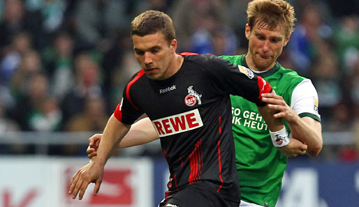 Lukas Podolski (l.) und Per Mertesacker standen bei der WM gemeinsam für Deutschland auf dem Feld