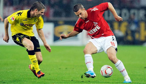 Kölns Lukas Podolski (r.) erzielte beim 1:2 im Hinspiel den vorübergehenden Ausgleich