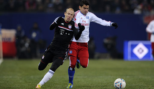 Bayern-Star Arjen Robben (l.) im Duell mit Tomas Rincon