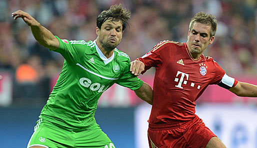 Das Hinspiel gewann der FC Bayern mit Kapitän Lahm (r.) 3:0 gegen Diegos Wolfsburger