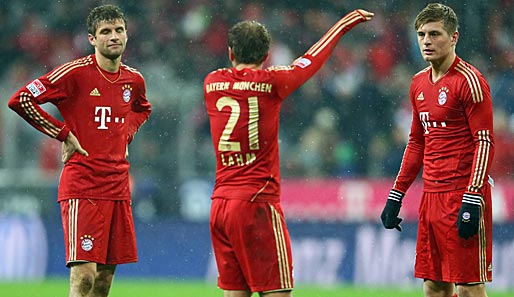 Thomas Müller, Philipp Lahm und Toni Kroos nach der Niederlage gegen Leverkusen