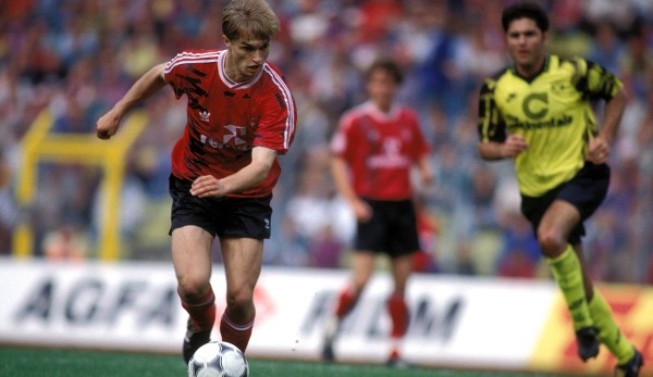 Christian Wück in the jersey of 1. FC Nuremberg in a game against BVB.