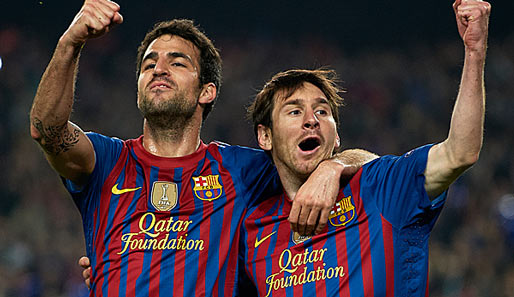 Lionel Messi (r.) hat den Rekord geknackt und steht nun bei 14. Saisontreffern in der CL