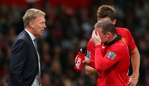 Manchesters Trainer David Moyes (l.) im Gespräch mit Wayne Rooney