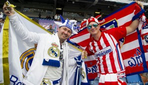 REAL MADRID - ATLETICO MADRID 3:0: In den Farben getrennt, in der Sache vereint: Diese beiden Fans haben Bock auf ein Fußballfest im Santiago Bernabeu