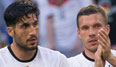 Emre Can und Lukas Podolski sind bisher noch ohne Einsatz bei dieser EM