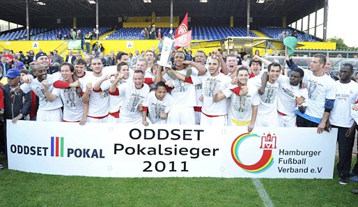 Vor kurzem feierten die Spieler und Trainer des Eimsbütteler TV den Titel beim Oddset-Pokal