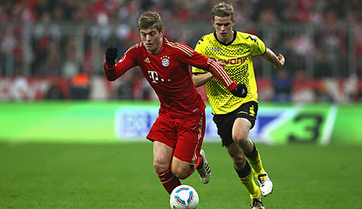 Toni Kroos (l.) sinnt auf Revanche gegen den deutschen Meister Borussia Dortmund