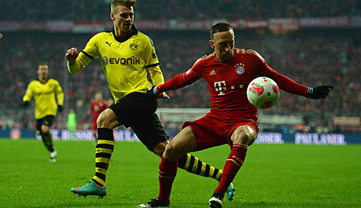Franck Ribery (r.) fehlt den Bayern aufgrund einer Rotsperre aus dem Achtelfinale gegen Augsburg