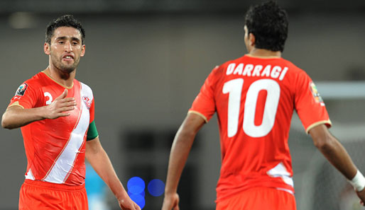 Karim Haggui (l.) von Hannover 96 ist Kapitän der tunesischen Nationalmannschaft