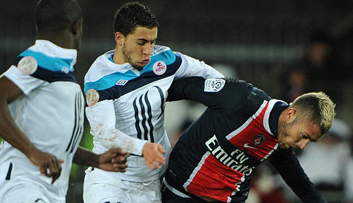 Eden Hazard (M.) hat mit Lille ebenso Chancen auf die Meisterschaft wie Jeremy Menez (r.) von PSG