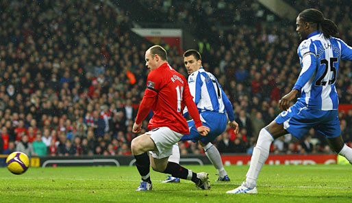 Bereits nach 51 Sekunden brachte Wayne Rooney (in Rot) den Ball im Wigan-Tor unter