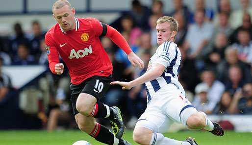 Wayne Rooney (l.) schoss das erste United-Tor der Saison