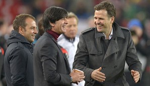 Joachim Löw und Oliver Bierhoff (r.) freuen sich für ihre Spieler in Diensten des FC Arsenal