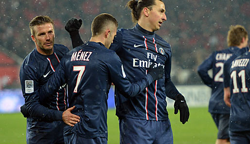 David Beckham (l.) leitete bei seiner Premiere für Paris das 2:0 ein