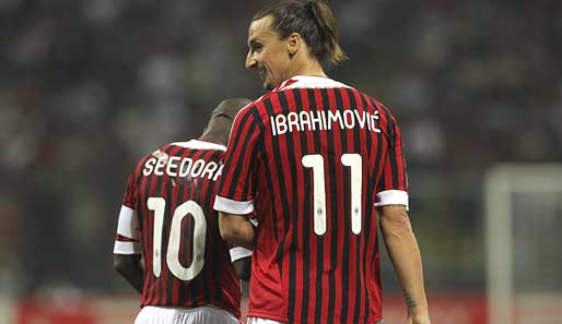 Clarence Seedorf (l.) und Zlatan Ibrahimovic vom AC Milan trafen jeweils beim 3:1-Erolg über Rom