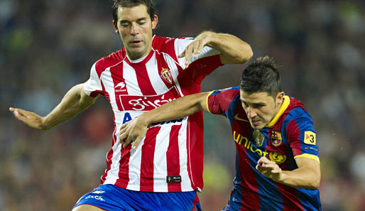 David Villa (r.) erzielte gegen Sporting Gijon seinen zweiten Treffer für den FC Barcelona