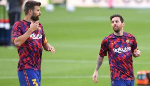 Gerard Pique (l.) und Lionel Messi sind seit vielen Jahren Teamkollegen beim FC Barcelona.