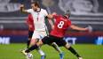 England (l.: Harry Kane) kann sich mit einem Sieg gegen Albanien für die WM 2022 qualifizieren.