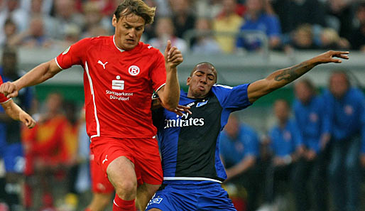 Dmitri Bulykin (l.) bestritt bereits 15 Bundesliga-Spiele für Bayer Leverkusen