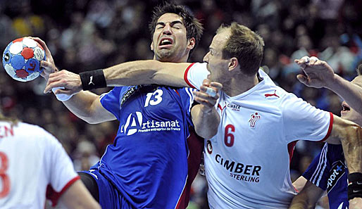 Nikola Karabatic (li.) musste in der Partie gegen Dänemark viel einstecken