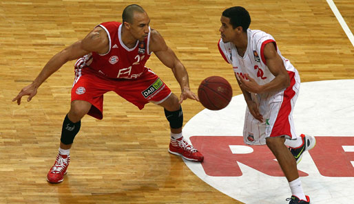 Brian Roberts (r.) holte drei mal in Folge das Double mit den Brose Baskets Bamberg