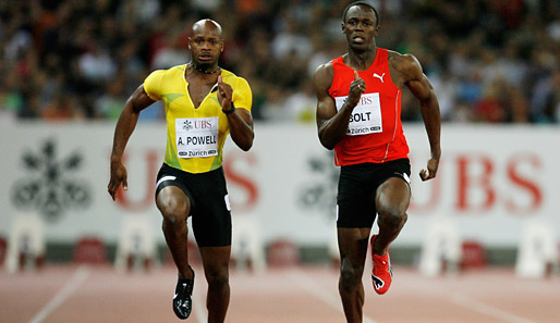 Usain Bolt (r.) gewann bei den olympischen Spielen in Peking dreimal Gold