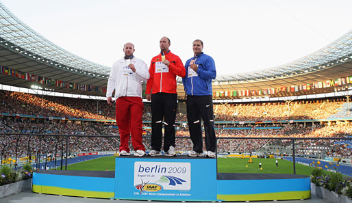 Die WM 2009 war ein mitreißendes Fest, nicht nur wegen der Goldmedaille von Robert Harting (M.)