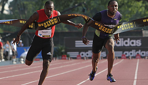 Richard Thompson (r.) lief in Port of Spain die 100 Meter in 9,85 Sekunden