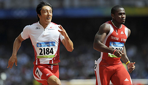 Darrel Brown (r.) bei einem Sprintlauf in Peking gegen Kiryu-Landsmann Nobuharu Asahara